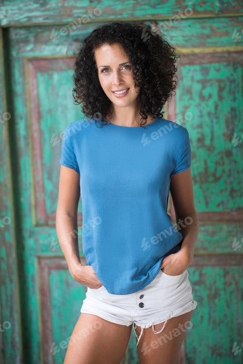 Preview: Portrait of smiling woman with curly hair