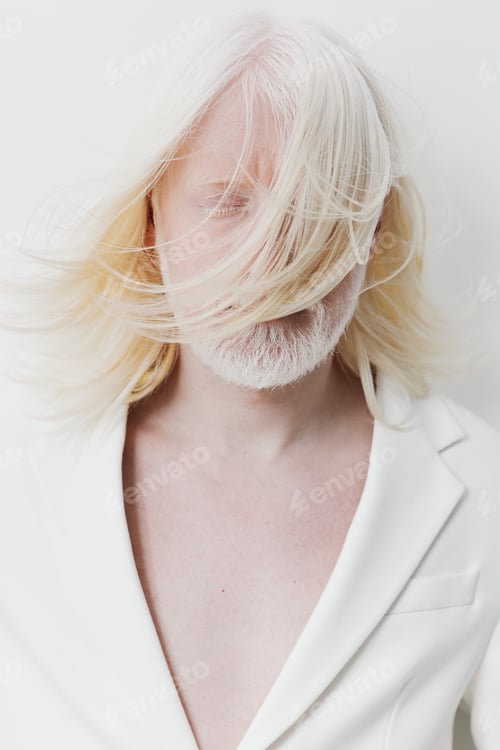 Preview: Portrait of a person with long, flowing white hair partially covering their face, dressed in a white