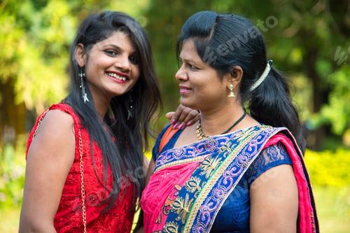 Preview: Portrait of happy mother and daughter embracing.