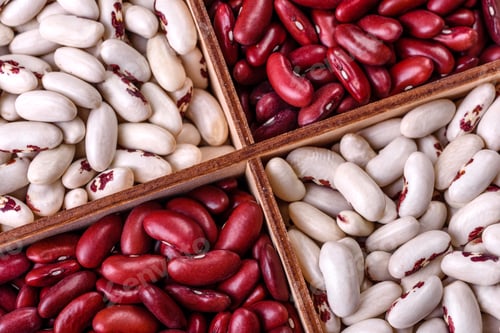 Preview: dry raw beans on a dark concrete background