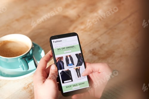 Preview: Close Up Of Woman Shopping For Clothes Online Using Mobile Phone App