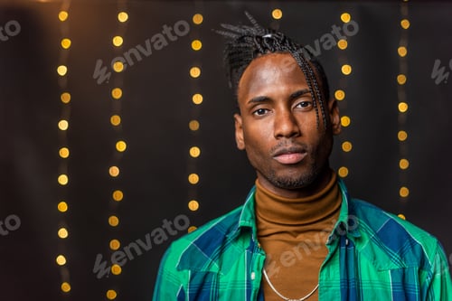 Preview: Young African American with braids looking at the camera