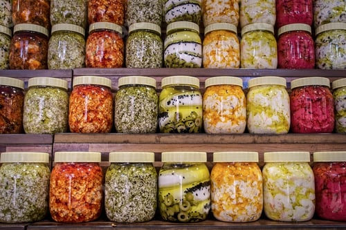 Preview: Jars with variety of pickled vegetables. Preserved food.