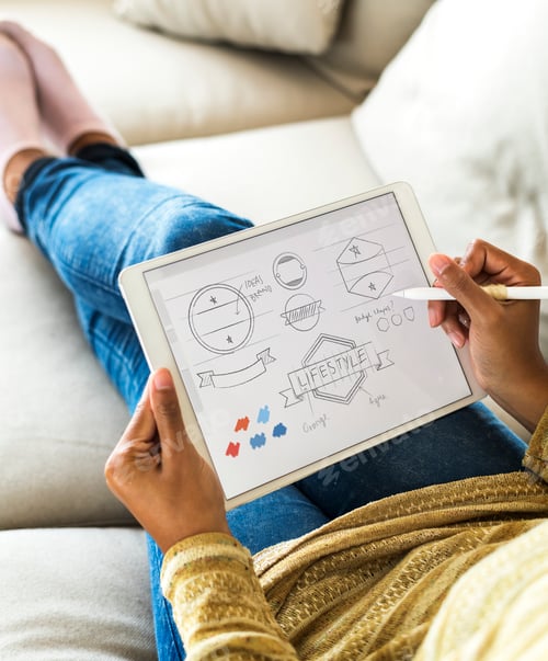 Preview: Woman designing banner icon on digital tablet