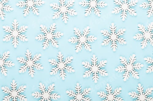 Preview: Christmas background. White snow decorations on a pink background.