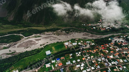 Preview: aerial view of city in cloudy mountains, Georgia