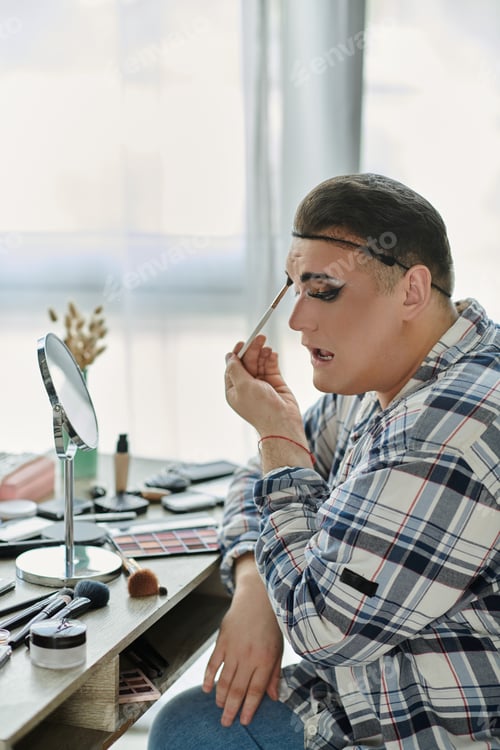 Preview: A Moment of Self-Expression: Applying Makeup in a Stylish Plaid Shirt