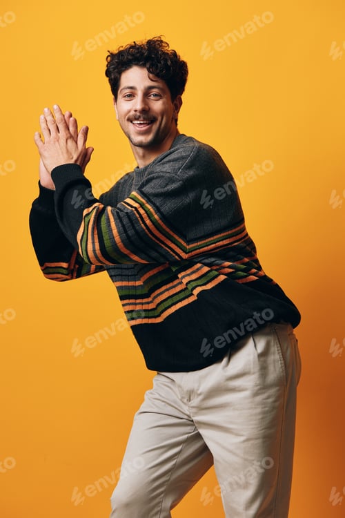 Preview: Smile man trendy sweater happy background portrait orange fashion