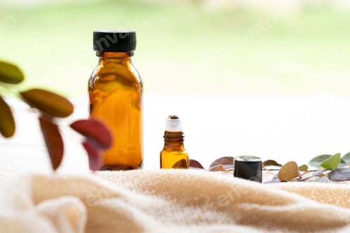 Visualização: Frasco de vidro âmbar com fundo bokeh