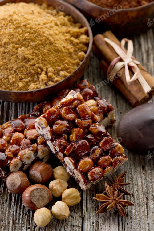 Preview: hazelnut brittle on wood with ingredients