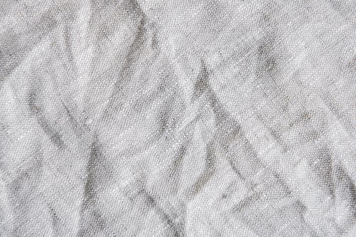 Preview: Gray textile linen tablecloth in full frame.