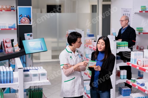 Preview: Drugstore worker advising buyer food additive tablets