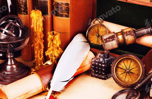 Preview: Old books, feather pen and ink bottle, old scroll with red wax seal, vintage compass.