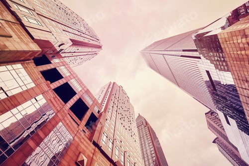 Preview: Looking up at skyscrapers in clouds, Chongqing, China.