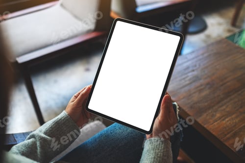 Preview: Mockup image of a woman holding digital tablet with blank white desktop screen