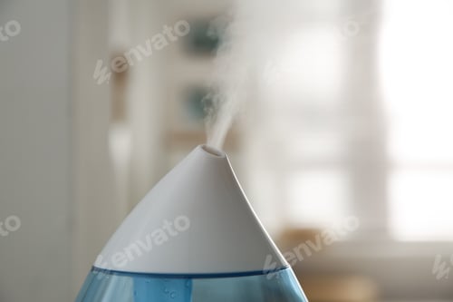 Preview: Modern humidifier indoors, closeup view. Home appliance