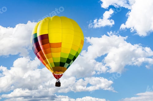 Preview: Colorful hot air balloon flying over the blue sky