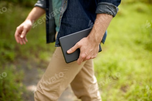 Preview: A farmer working in his fields in New York State, USA.