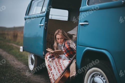 Preview: Relaxing with her favorite book.