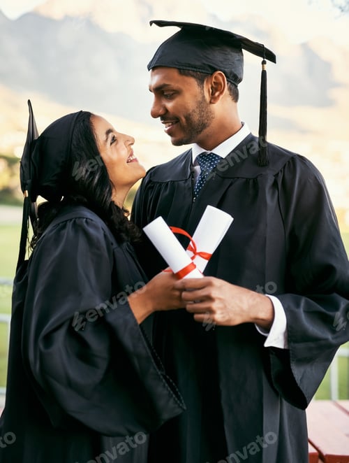 Preview: Im glad that we could share this milestone together. Shot of two students on graduation day.