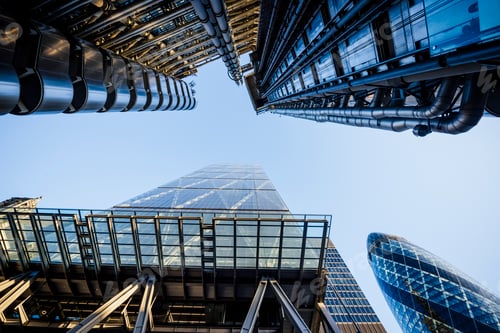 Preview: Low angle view of blue sky from122 Leadenhall St, The Cheesegrater and Gherkin, London, UK