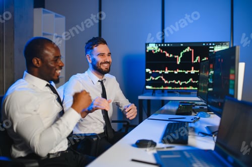 Preview: Team of traders working with forex trading charts and graphs on computer screen