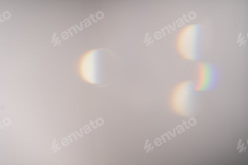 Preview: Blue light flare prism rainbow flares overlay effect on black background, light crossing crystals