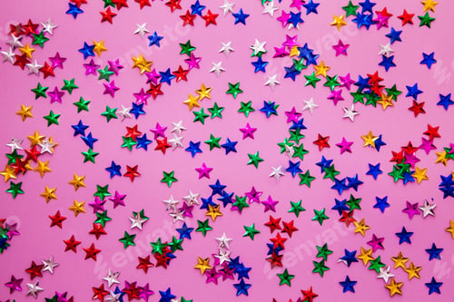 Preview: Bright multicolor stars confetti on violet background