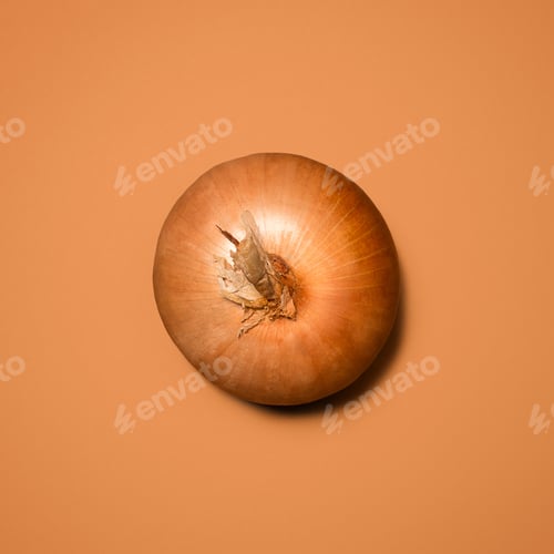 Preview: The perfect base for a soup. Shot of an onion against a studio background.