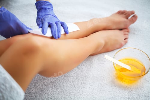 Preview: Waxing. Beautician Waxing Woman's Leg In Spa Salon