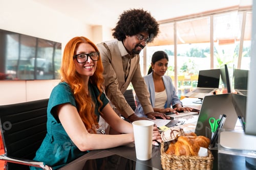 Preview: Multiethnic small group of businesspeople meeting in a coworking company office