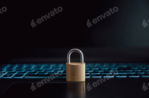 Preview: Golden padlock placed on an open black laptop computer