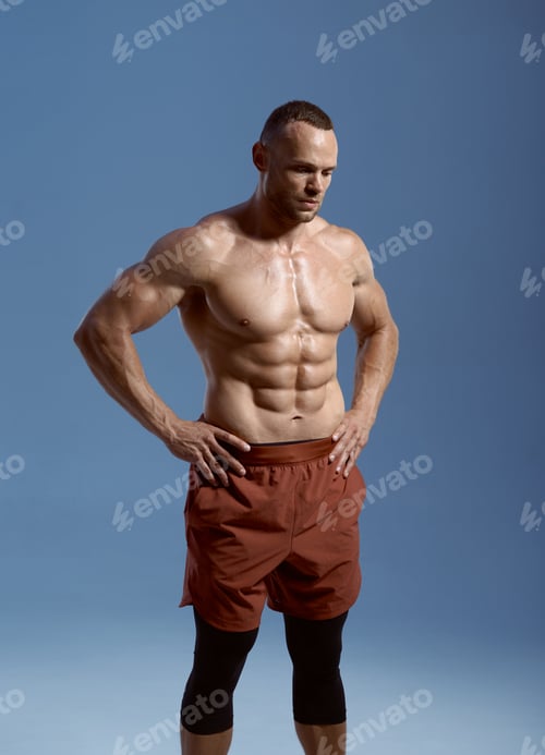 Preview: Muscular male athlete, photo shoot in studio