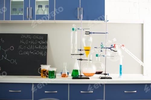 Preview: Science laboratory interior with colorful reagents and blackboard