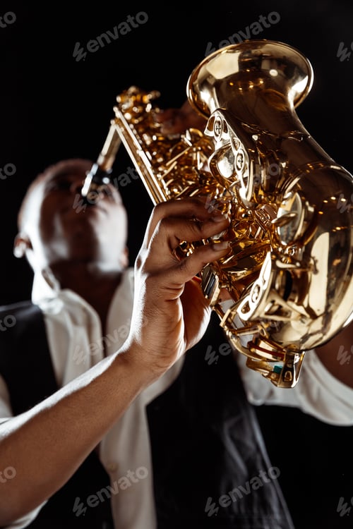 Preview: African American jazz musician playing the saxophone.