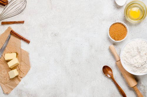 Preview: Ingredients for making dough dishes: cakes, cookies, muffins, pies on a gray background.