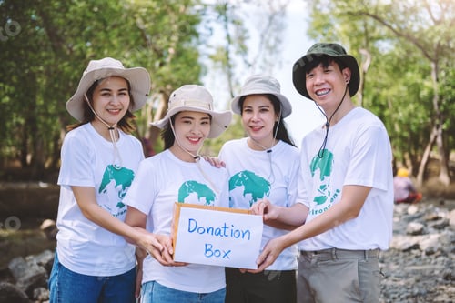 Vista previa: Group of Asian diverse people volunteer holding a speech sign for World Environment Day campaign.