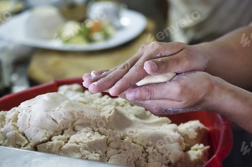 Preview: Closeup of a person making handmade tortillas