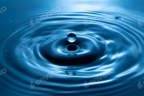 Preview: Closeup of water drop splash under the lights - perfect for wallpapers
