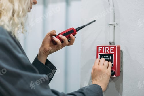 Preview: Warehouse workers use talkie of an emergency in a factory worker.