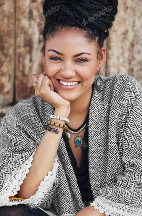 Preview: Cropped shot of an attractive young woman posing outdoors