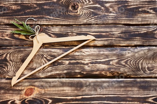 Preview: Wooden Hanger with Greenery on Wood Background