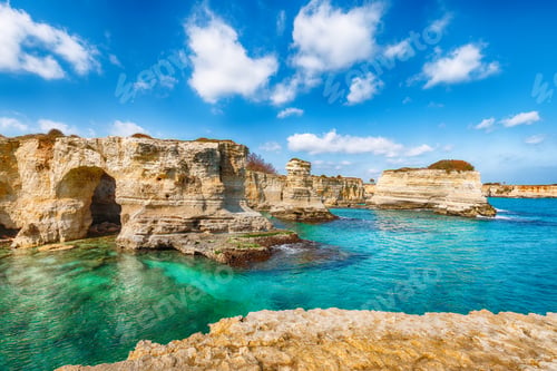 Preview: Picturesque seascape with cliffs, rocky arch at Torre Sant Andrea