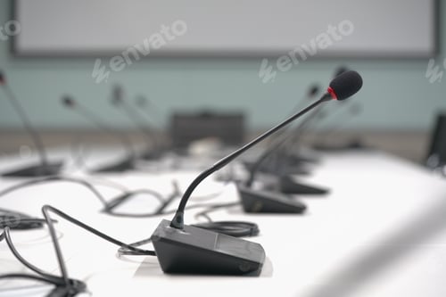 Preview: Close up microphone on table meeting room.