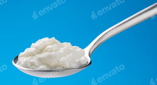Preview: Fresh curdled milk, homemade sour yogurt in spoon