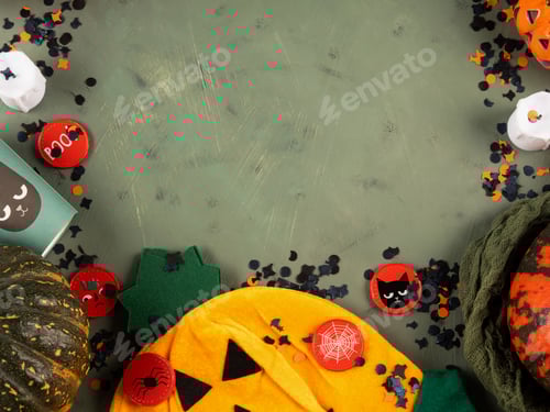 Preview: Halloween green frame background flatlay with pumpkins and party decor