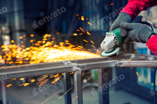 Preview: Welder used grinding stone on steel in factory with sparks, Welding process at the industrial