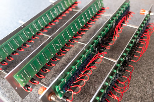 Preview: Close-up of a metal panel with microchips