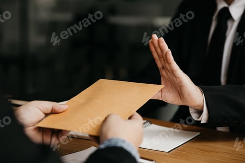 Preview: Business man raised her hand to deny accepting a bribe from a business partner.