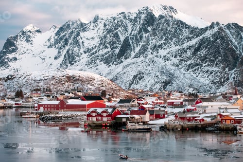 Preview: Boat sailing on fishing village in snowy valley